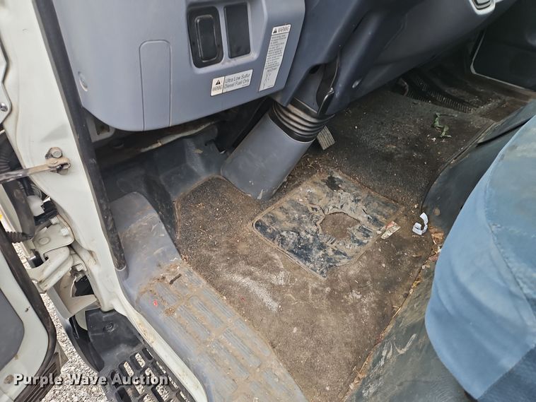 image for item EI8828 2017 Mitsubishi Fuso Canter FE160 Crew Cab flatbed truck