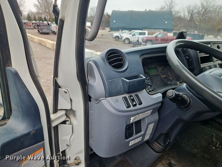 image for item EI8828 2017 Mitsubishi Fuso Canter FE160 Crew Cab flatbed truck