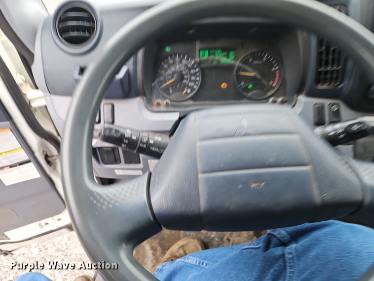 image for item EI8828 2017 Mitsubishi Fuso Canter FE160 Crew Cab flatbed truck