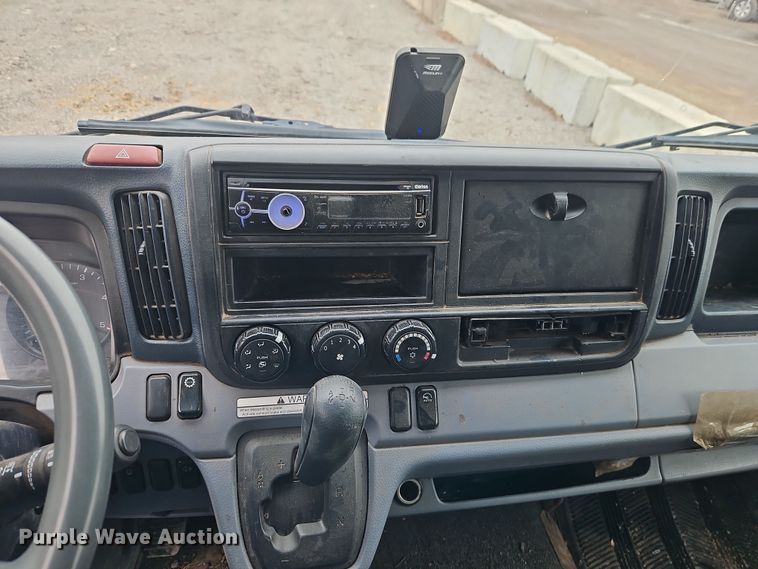 image for item EI8828 2017 Mitsubishi Fuso Canter FE160 Crew Cab flatbed truck