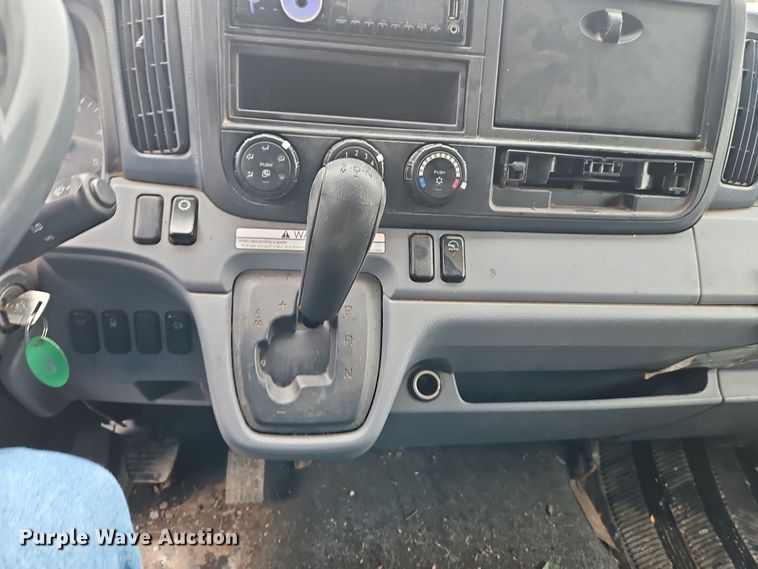 image for item EI8828 2017 Mitsubishi Fuso Canter FE160 Crew Cab flatbed truck