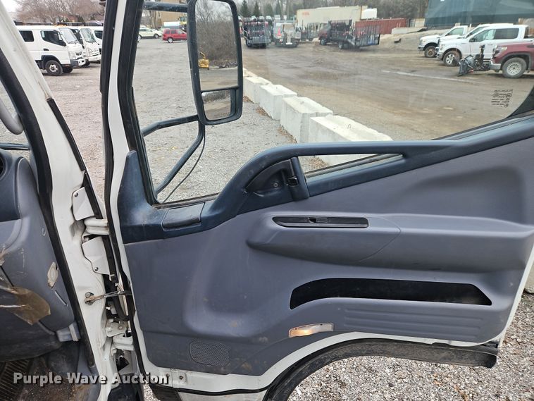 image for item EI8828 2017 Mitsubishi Fuso Canter FE160 Crew Cab flatbed truck