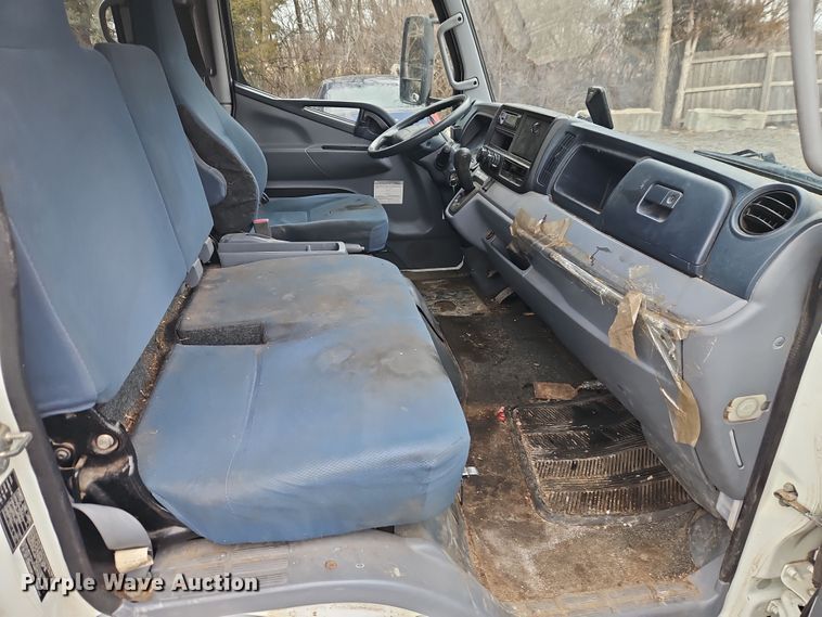 image for item EI8828 2017 Mitsubishi Fuso Canter FE160 Crew Cab flatbed truck