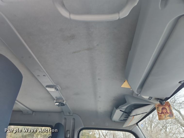 image for item EI8828 2017 Mitsubishi Fuso Canter FE160 Crew Cab flatbed truck