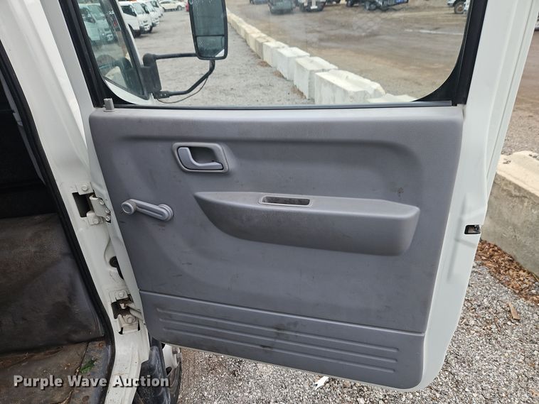 image for item EI8828 2017 Mitsubishi Fuso Canter FE160 Crew Cab flatbed truck