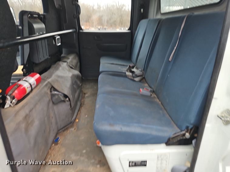 image for item EI8828 2017 Mitsubishi Fuso Canter FE160 Crew Cab flatbed truck