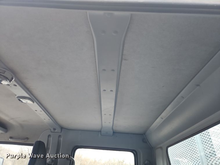 image for item EI8828 2017 Mitsubishi Fuso Canter FE160 Crew Cab flatbed truck