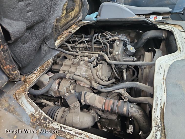 image for item EI8828 2017 Mitsubishi Fuso Canter FE160 Crew Cab flatbed truck