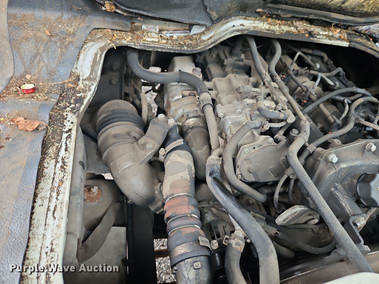 image for item EI8828 2017 Mitsubishi Fuso Canter FE160 Crew Cab flatbed truck