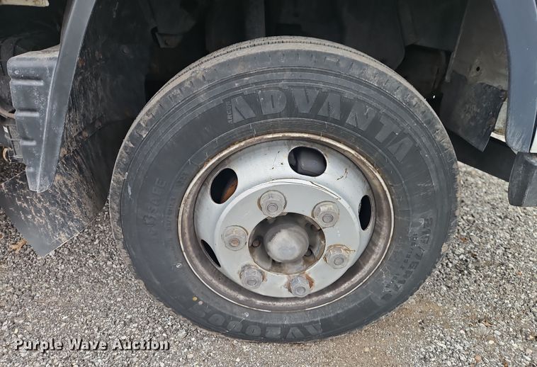 image for item EI8828 2017 Mitsubishi Fuso Canter FE160 Crew Cab flatbed truck