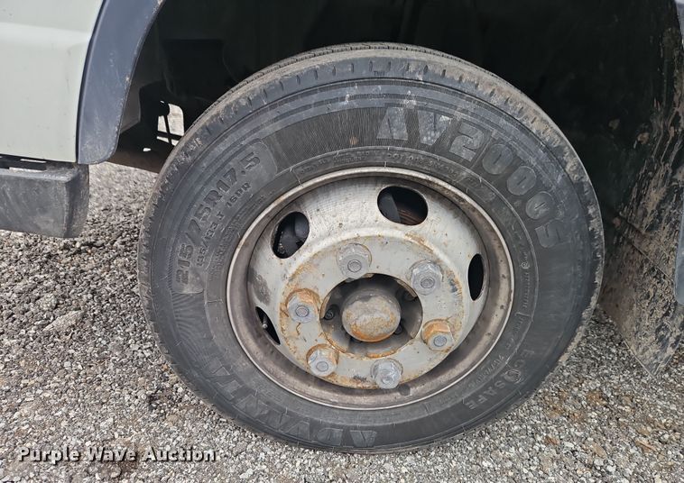 image for item EI8828 2017 Mitsubishi Fuso Canter FE160 Crew Cab flatbed truck