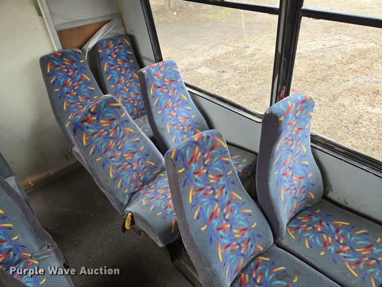 image for item EQ3957 2001 Ford  E450 Super Duty shuttle bus