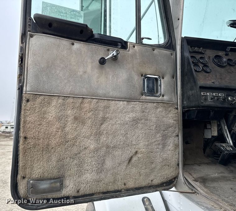 image for item DT0519 1989 Kenworth T400A truck cab and chassis with tree spade