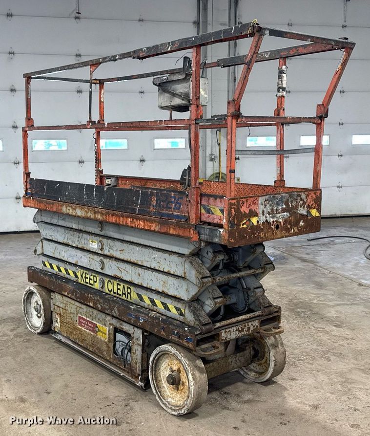 image for item DT0568 2001 Skyjack SJ III 3226 scissor lift