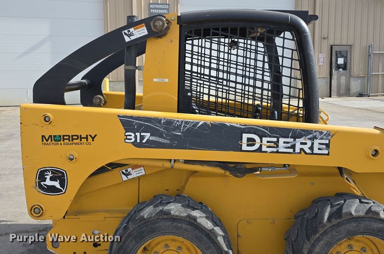 image for item DW3101 2007 John Deere 317 skid steer loader