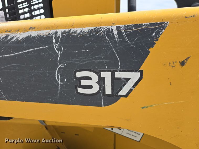 image for item DW3101 2007 John Deere 317 skid steer loader