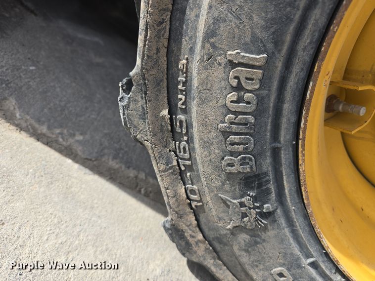 image for item DW3101 2007 John Deere 317 skid steer loader