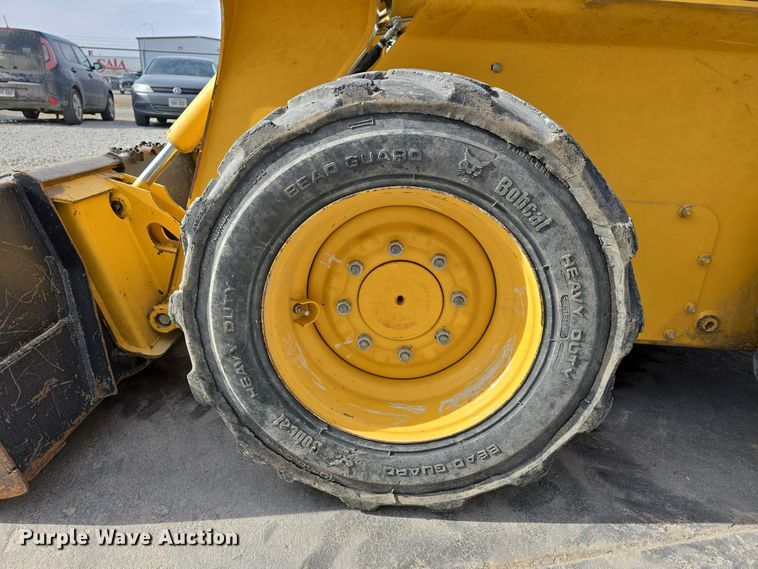 image for item DW3101 2007 John Deere 317 skid steer loader