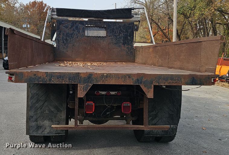 image for item OJ9012 2002 Chevrolet  C7500 dump flatbed truck