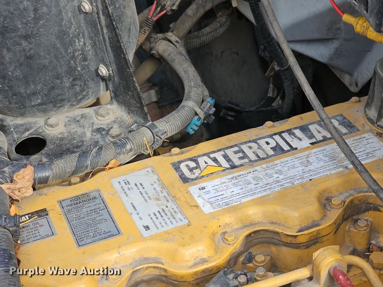 image for item OJ9012 2002 Chevrolet  C7500 dump flatbed truck