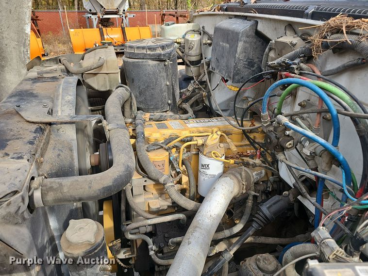 image for item OJ9012 2002 Chevrolet  C7500 dump flatbed truck