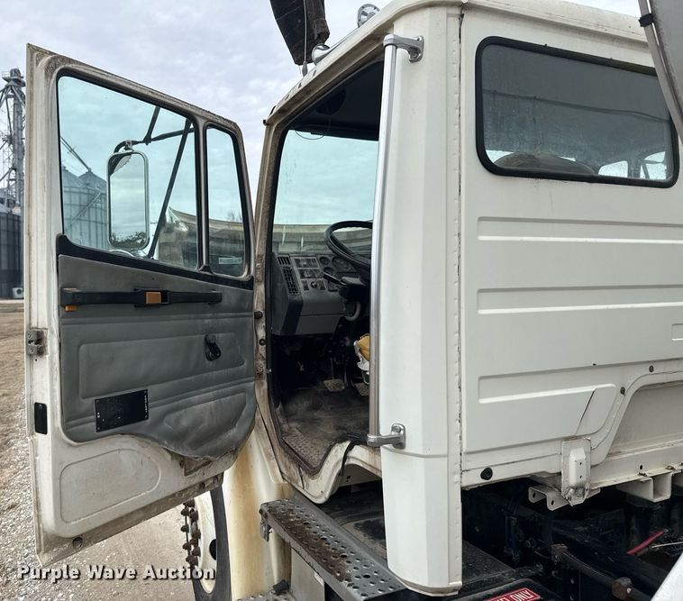 image for item DO0384 1996 Freightliner FL70 feed mixer truck