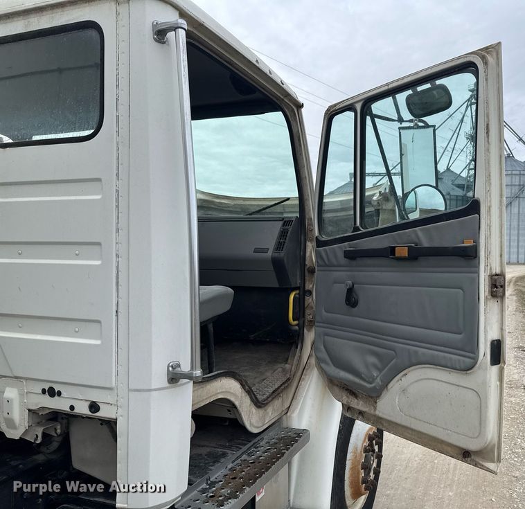 image for item DO0384 1996 Freightliner FL70 feed mixer truck