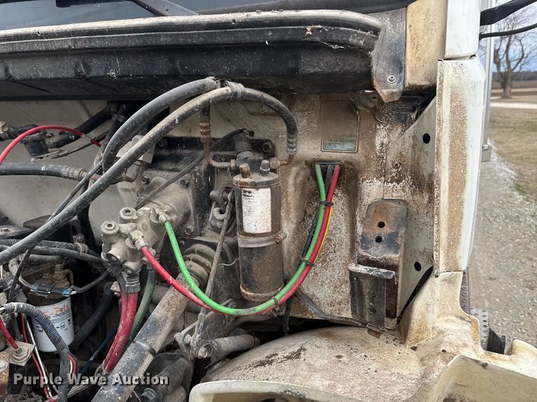 image for item DO0384 1996 Freightliner FL70 feed mixer truck