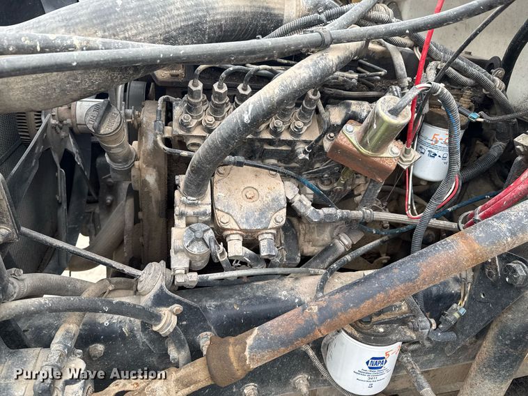 image for item DO0384 1996 Freightliner FL70 feed mixer truck