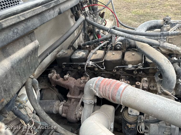 image for item DO0384 1996 Freightliner FL70 feed mixer truck