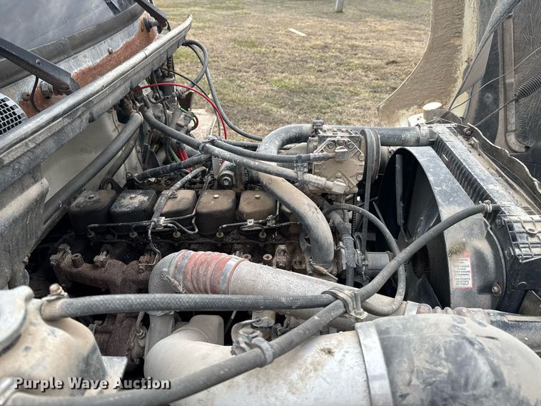 image for item DO0384 1996 Freightliner FL70 feed mixer truck