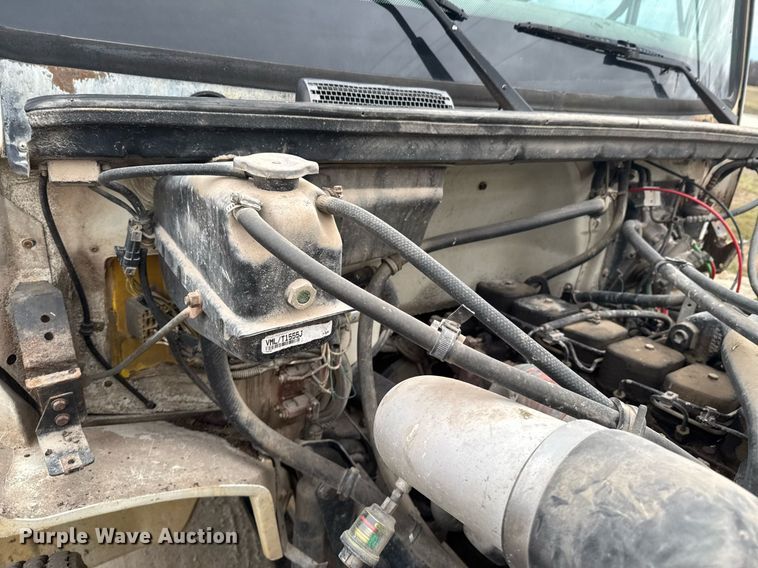 image for item DO0384 1996 Freightliner FL70 feed mixer truck