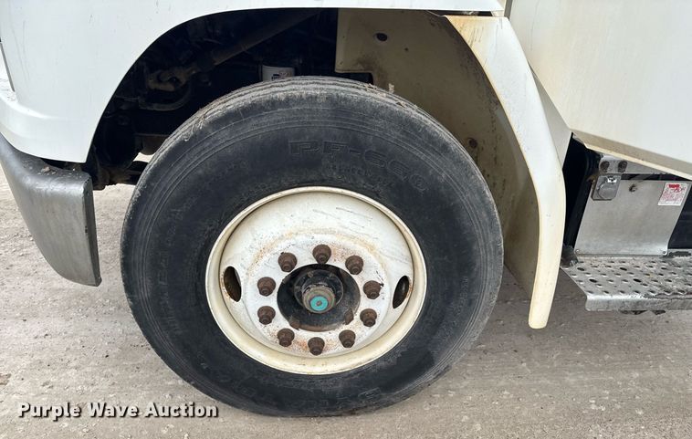 image for item DO0384 1996 Freightliner FL70 feed mixer truck