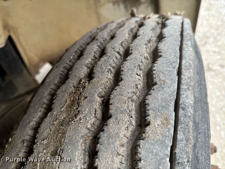 image for item DO0384 1996 Freightliner FL70 feed mixer truck