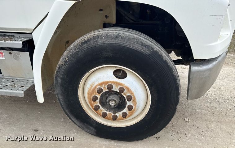 image for item DO0384 1996 Freightliner FL70 feed mixer truck