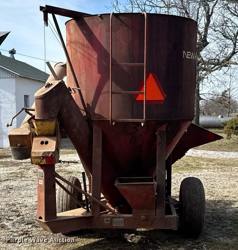 image for item DO0403 New Holland 355 feed mixer