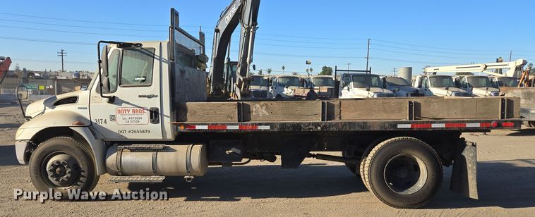 image for item EI4099 2010 International Durastar 4300 dump flatbed truck