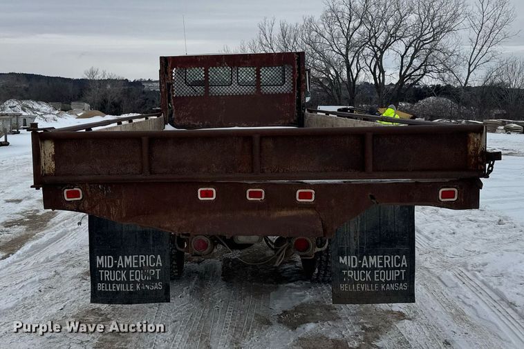 image for item NN9578 1996 Freightliner FL70 dump flatbed truck