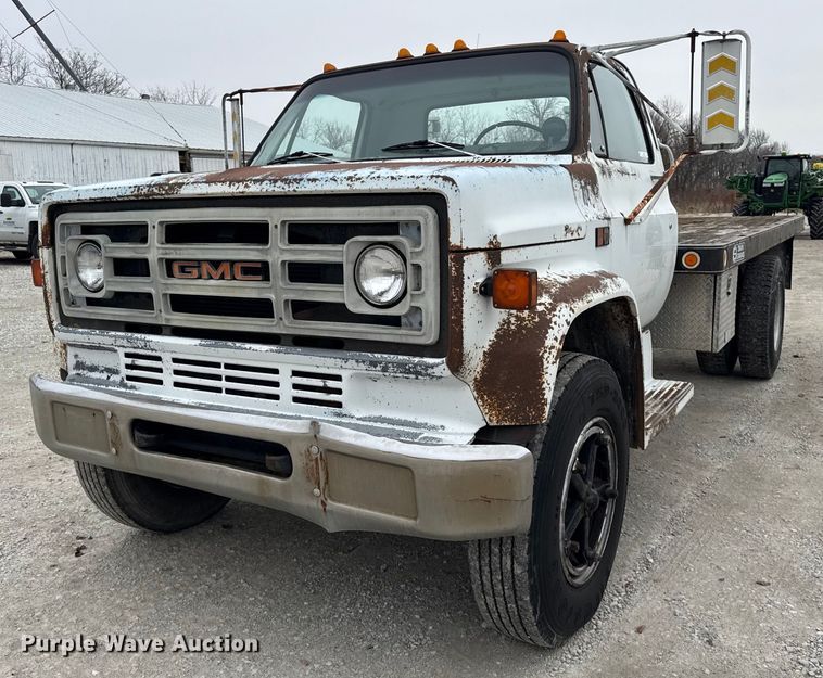 image for item DH9564 1985 GMC C7000 dump flatbed truck