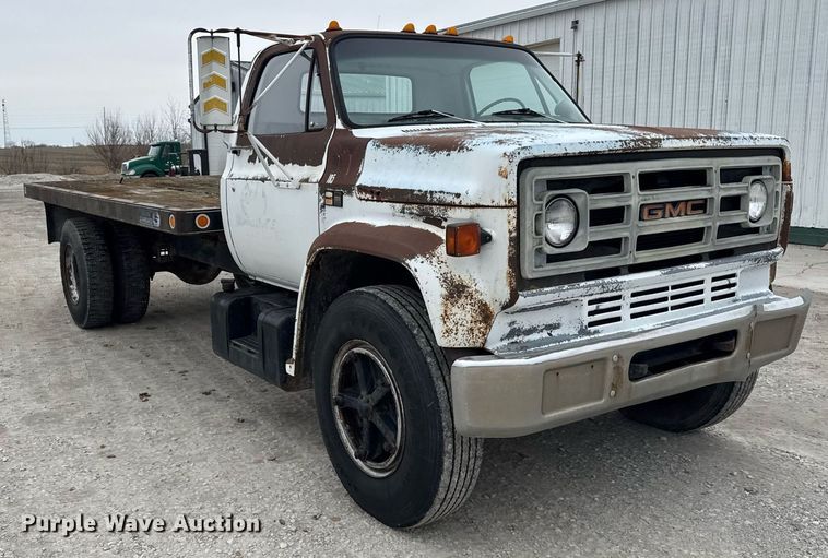 image for item DH9564 1985 GMC C7000 dump flatbed truck