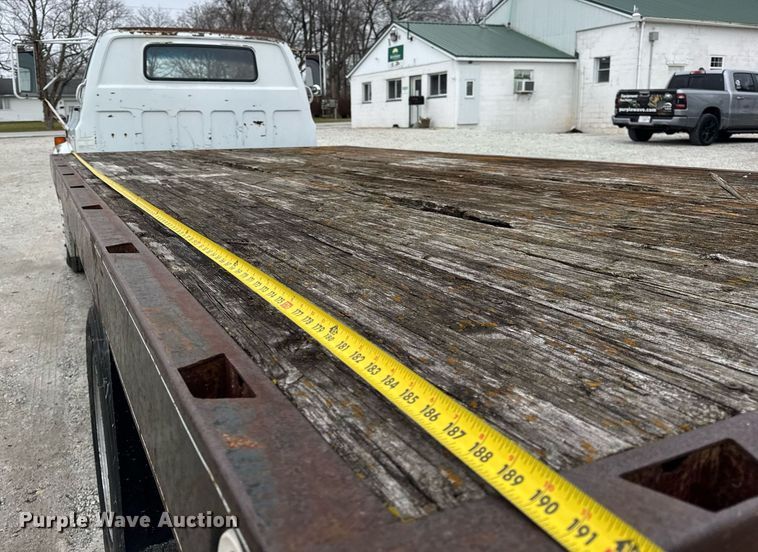 image for item DH9564 1985 GMC C7000 dump flatbed truck