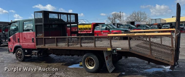 image for item DH9864 2008 Isuzu NPR HD Crew Cab flatbed truck