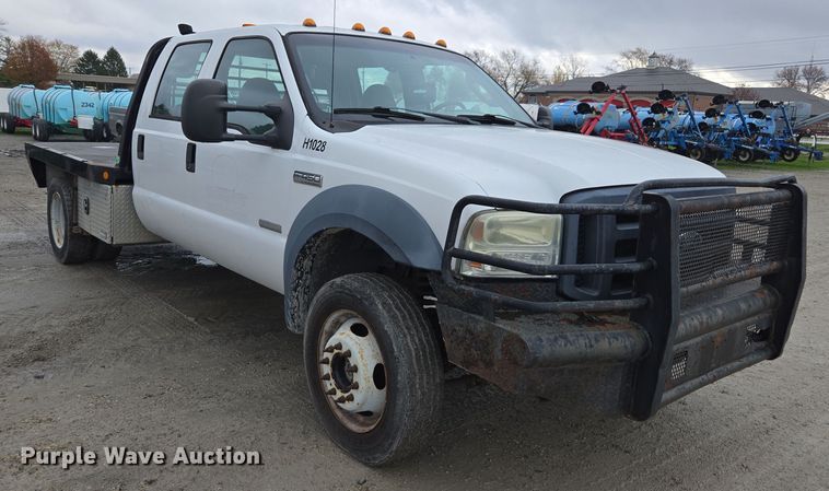 image for item DX1527 2007 Ford F450 Super Duty Crew Cab flatbed truck