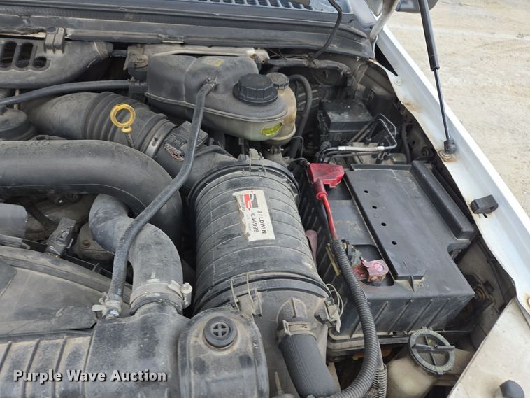 image for item DX1527 2007 Ford F450 Super Duty Crew Cab flatbed truck