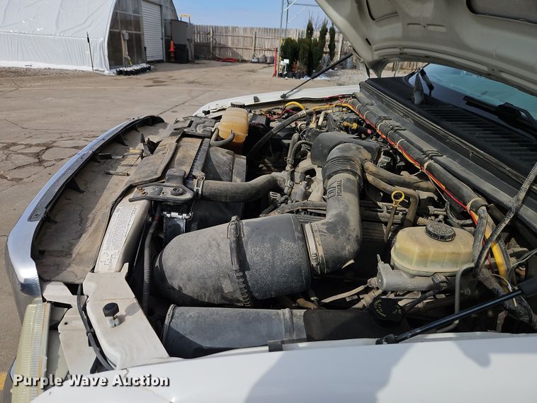 image for item EI8853 2004 Ford F550 Super Duty dump flatbed truck