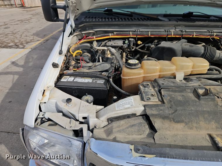 image for item EI8853 2004 Ford F550 Super Duty dump flatbed truck