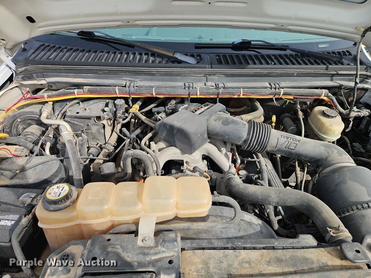 image for item EI8853 2004 Ford F550 Super Duty dump flatbed truck