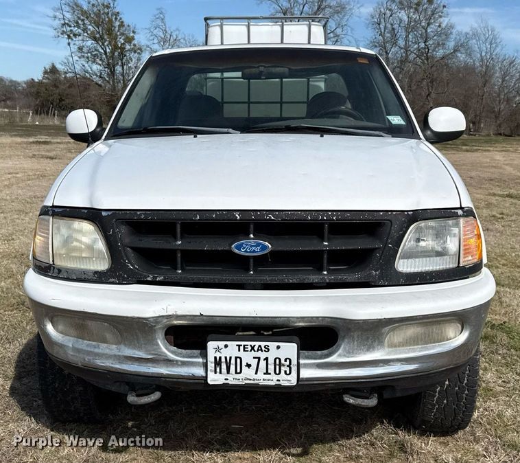 image for item EJ3482 1998 Ford F150 SuperCab flatbed pickup truck 