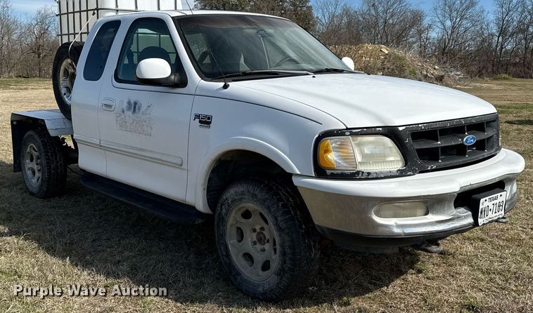 image for item EJ3482 1998 Ford F150 SuperCab flatbed pickup truck 