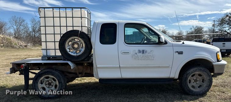 image for item EJ3482 1998 Ford F150 SuperCab flatbed pickup truck 